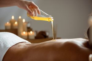 honey pouring woman s naked back spa salon